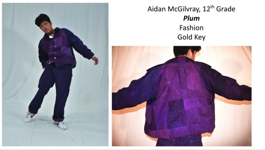 teenage boy modeling purple jacket