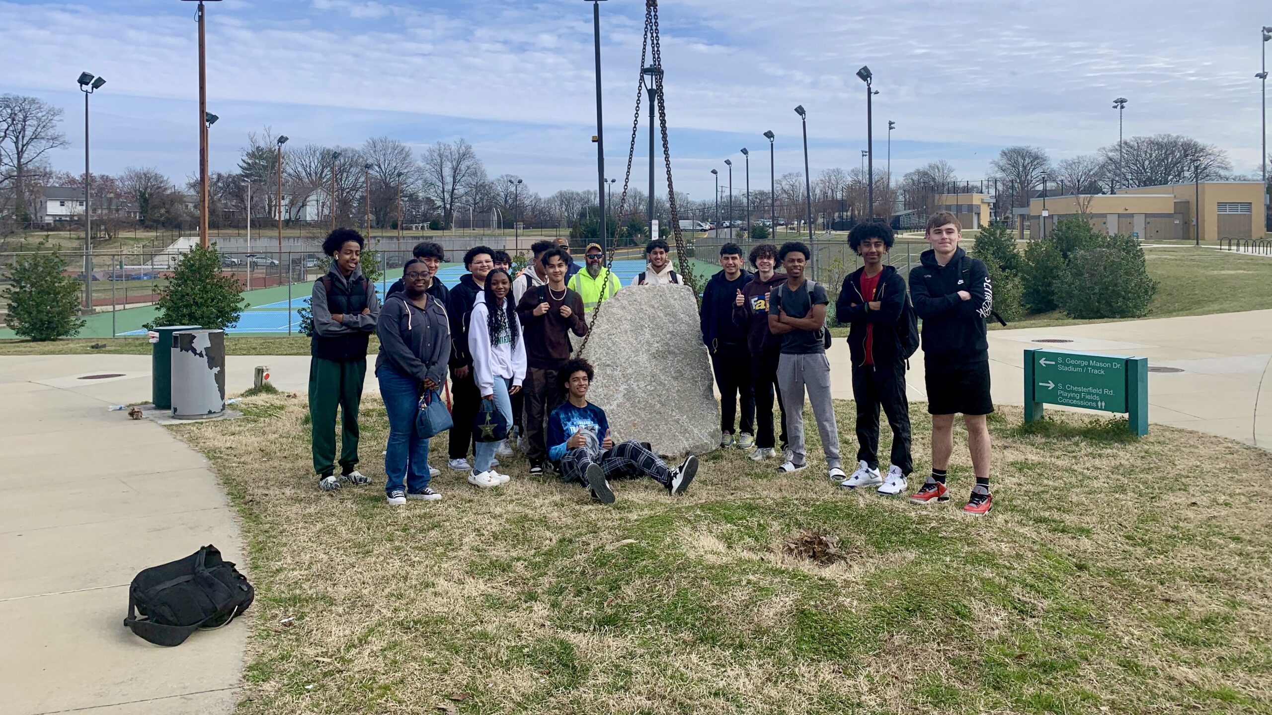 students standing in front of new spirit rock