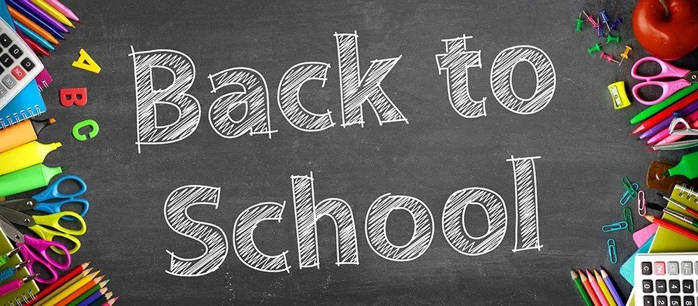 Back to school night in chalk on a blackboard.